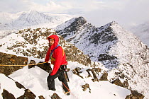 Climber i on Sgurr Alasdair on the Cuillin Ridge, Isle of Skye, Scotland. March 2006