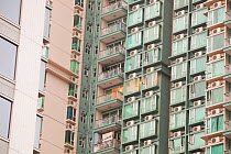 Flats in Kowloon with air conditioning units. Hong Kong, February 2010.