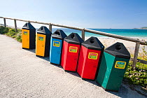 Recycling bins at Sennen Cove, Cornwall, England, UK. June.