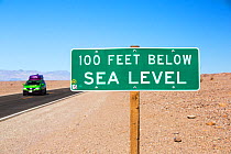 Sign at 100 feet below sea level in Death Valley. Death Valley is the lowest, hottest, driest place in the USA, with an average annual rainfall of around 2 inches, some years it does not receive any r...