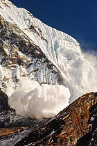 Avalanche on Machapuchare  / Fishtail Peak in the Annapurna Himalaya, Nepal. It was caused by a massive block of glacial ice detaching from the summit cliffs. 29th December 2012.