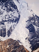 Avalanche on Machapuchare or Fishtail Peak in the Annapurna Himalaya, Nepal. It was caused by a massive block of glacial ice detaching from the summit cliffs,  29th December 2012.