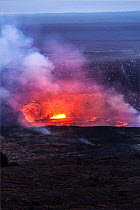 Lava glowing in the Halema'uma'u Crater viewed from the Jaggar Museum in Volcanoes National Park, Hawaii. December 2016.