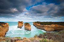 Sea stacks and cliffs in bay, Great Ocean Road, Victoria, Australia, June.