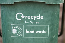 Recycling bin for food waste. Surrey, England, UK. January.