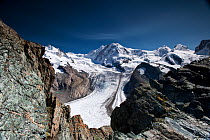 The Gorner Glacier with the peaks of The Briethorn, Western Lyskamm, Castor and Pollux . Switzerland. September 2017. The Gornerglacier has a medial moraine running along its centre, formed when two l...