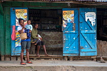 People at a local shop in Andasibe village, Andasibe-Mantadia National Park, Eastern Madagascar. August 2017.