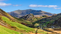 Drws-y-coed valley, view east to Clogwynygarreg Hill with Mount Snowdon in background. Snowdonia National Park, North Wales, UK. October 2017.