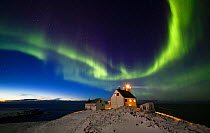 Aurora borealis over Hornoya lighthouse. Hornoya, Norway, March.