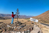 Artist selling curios at  the pass near Roma, Lesotho. August 2017