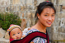 Mother with child from Xiang Bai Lisu village, Tongbiguan Nature Reserve, Dehong Prefecture, Yunnan province, China, May 2017.