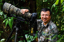 Portrait of chinese Photographer Wei Jun, Tongbiguan Nature Reserve, Dehong prefecture, Yunnan province, China, May.