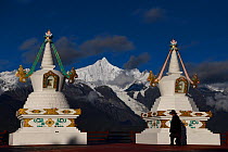 Stupas in Feilaisi, in front of Meili Snow Mountain, 6740 m, a Sacred mountain for Tibetan Buddhists, yet unclimbed, Yunnan, China. October 2017.