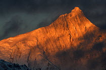 Meili Snow Mountain, 6740 m, covered in sunset light. a Sacred mountain for Tibetan Buddhists, Yunnan, China, October 2017.