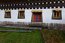 The local temple with decorated windows, Lower Yubeng village, Meili Snow Mountain, National park, Yunnan, China, October 2017.