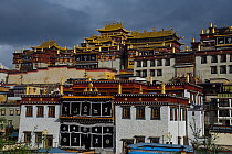 View of Tibetan Lamaist Songtsam Monastery houses, Shangri-La, Yunnan, China, October 2017.