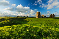 Neolithic earthworks and Knowlton Church, Dorset, England, UK. May 2014.
