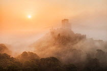 Corfe Castle in the mist, Corfe, Isle of Purbeck, Dorset, England, UK. May 2012.