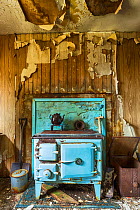 Stove in abandoned cottage, Isle of Harris, Outer Hebrides, Scotland, UK. March 2014.