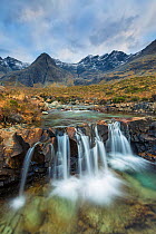 Fairy Pools with Black Cuillin mountains in background, Isle of Skye, Inner Hebrides, Scotland, UK. January 2014.