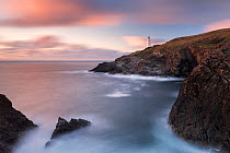 Trevose lighthouse at sunset and high water, Trevose head, near Padstow, Nortrh Cornwall, July 2017.