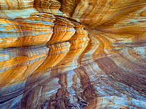 The Painted Cliffs at Maria Island National Park, east coast of Tasmania, Australia. January 2018.  The iron oxides in the rock were left behind by ground water percolating through the cliffs. This cr...