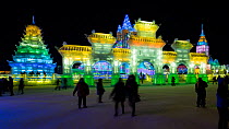 Timelapse of people visiting the illuminated ice sculptures at the Harbin Ice and Snow Festival at night, Heilongjiang Province, China, February 2015. Hellier