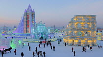 Timelapse at dusk of people visiting the illuminated ice sculptures at the Harbin Ice and Snow Festival, Heilongjiang Province, ChinaFebruary 2015. Hellier