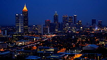 View of the Atlanta skyline at night, with traffic moving on iInterstate 85, Atlanta, Georgia, USA, April 2015. Hellier