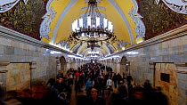 Timelapse of commuters in Moscow's Komsomolskaya metro station, showing vaulted ceiling and chandeliers, Russia, May 2016. Hellier