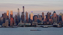 View of Manhattan at dusk across the Hudson River, New York, USA, June 2016. Hellier