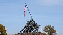 Timelapse from day to night of an American flag fluttering on the Iwo Jima Memorial, Washington DC, USA, June 2016. Hellier