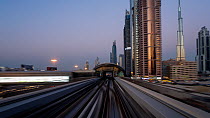 Timelapse looking out of the front of a train on the elevated Dubai Metro System, Dubai, United Arab EmiratesJanuary 2017. Hellier