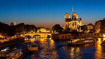 Timelapse of boats on the River Seine at night, next to Notre Dame, Paris, France, May 2016. Hellier
