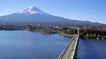 Aerial shot tracking over Kawaguchi Lake, with the Mount Fuji in the background, Honshu Island, Japan, November 2017. Hellier