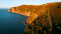 Aerial shot tracking along the coast of Exmoor National Park, showing Countisbury Hill and Foreland Point with Sillery Sands below, Devon, England, UK, October 2017. Hellier