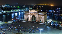 Timelapse of people watching projections on the Gateway of India at night, Mumbai, Maharashtra, India, January 2018. Hellier