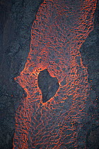 Aerial view of lava river flowing toward Kapoho, Puna District from fissure 8 of Kilauea volcano, near Pahoa, Hawaii. June 2018.