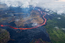 Aerial view of a river of lava, from Kilauea Volcano erupting from  fissure 8, Leilani Estates, Pahoa. Puna District, Hawaii. July 2018. June 2018.