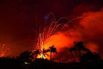 Lava from Kilauea Volcano erupts from fissures in Kapoho, shooting glowing lava bombs hundreds of meters into the sky and releasing clouds of poisonous gases. Puna District, near Pahoa, Hawaii. June 2...
