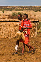 Maasai teenagers in village after dance.Kenya, Africa September 2006.