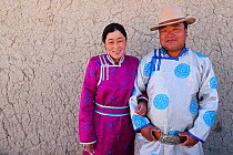 Mongolian shepherd Ge Ri Li Ao De with his wife Ao Te Gen, at their home, Inner Mongolia, China. May 2016