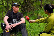 Wildlife photographer Staffan Widstrand being interviewed by Sichuan TV, Tangjiahe National Nature Reserve, Qingchuan County, Sichuan province, China