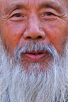 Portrait of Tao Grand Master Rinfarong, close up portrait, Louguantai temple, Xian, Shaanxi, China. This temple is where Lao Tze wrote the Tao Te Ching.