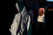 Young woman in hijab, Gate of Asmadin, City of Harar, Ethiopia February 2008.