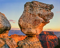 Cape Royal at sunset, with balanced rock in the foreground, and Wotan's Throne, Grand Canyon National Park, Arizona, USa.