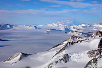 Aerial view of Transantarctic  mountains, taken en route  from the South Pole to Union Glacier.  Mount Vinson, the highest mountain in the Antarctic in background.