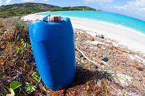 Discarded fuel container on a beach in tourist destination. Lizard Island, Great Barrier Reef, Queensland, Australia. July 2012.
