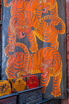 Painting of Tigers (Panthera tigris) at Boudhanath - Bauddhanath Stupa, Kathmandu Valley, Nepal. March 2018.