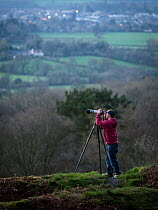 Photographer Oliver Hellowell taking pictures on the Blackdown Hills, Somerset, England, UK. April 2017